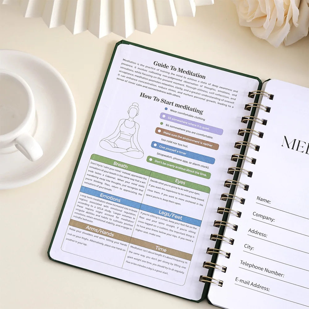 Meditation guide book open on a table with a cup and flowers in the background, for mindfulness meditation and mental health